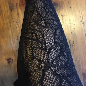 Bundle of black tights and thigh highs